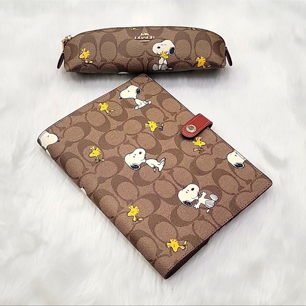 New with tags Coach x Peanuts Notebook and Pencil Case Set.